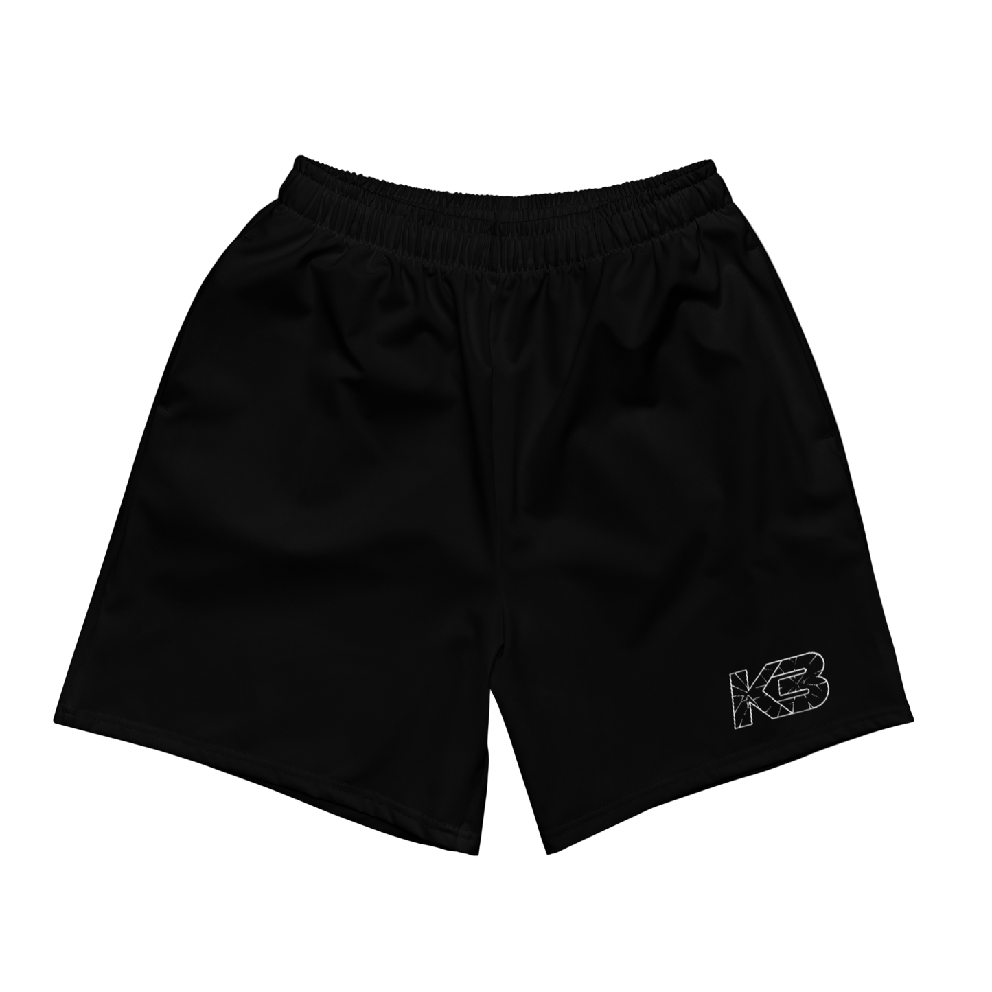 Black shorts with a logo on a light gray background with Halloween decorations.