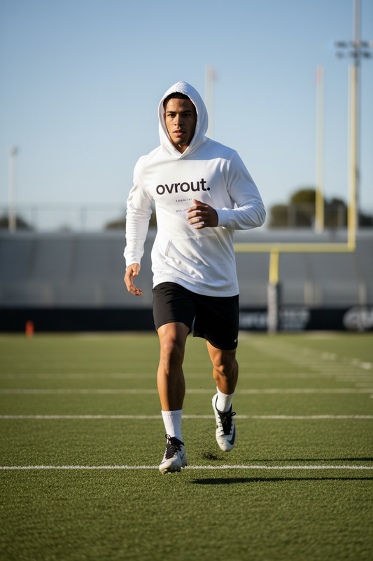 White football player in OVR & OUT hoodie tee